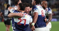 Blues' thrilling win clinches top spot in Super Rugby